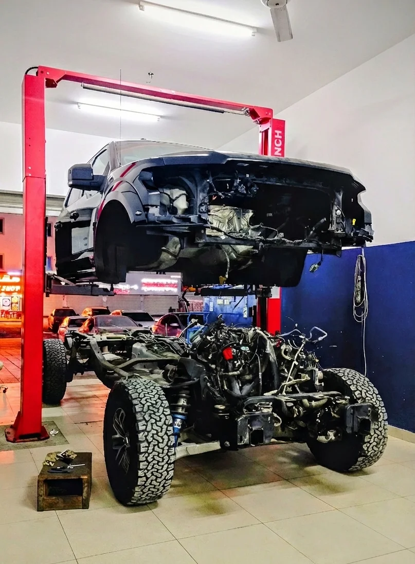 Full vehicle rebuild at Garage Lutis — Ford Raptor F-150 chassis restoration