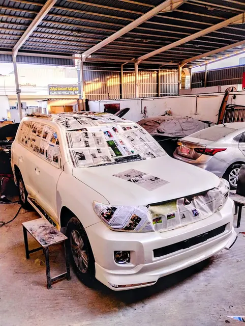 Toyota Land Cruiser masked for paint